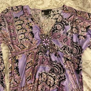 Flattering patterned purple top with rhinestones